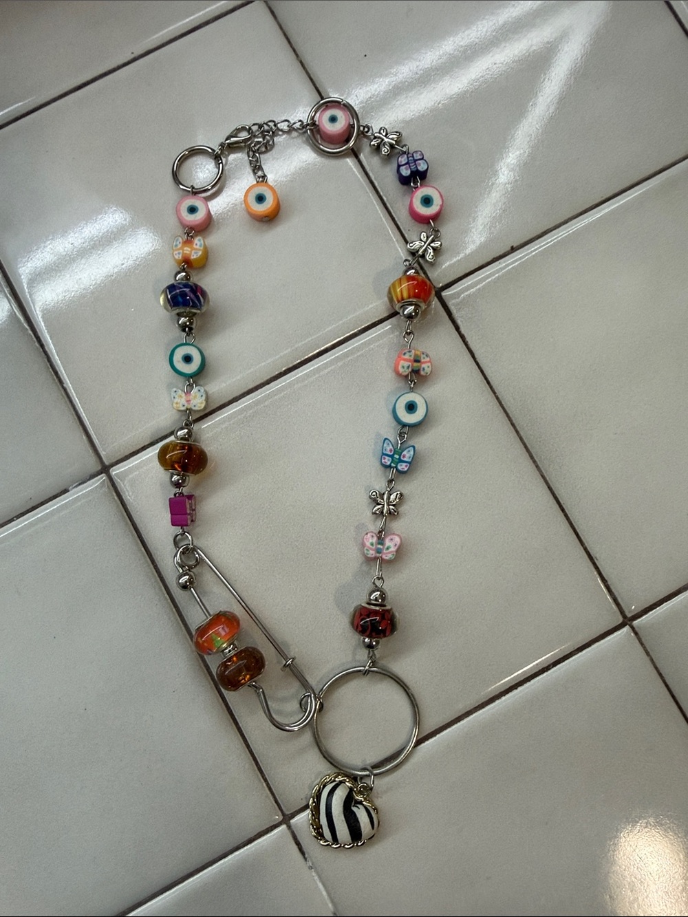 Colorful Glass Bead Necklace with Evil Eye & Butterfly Accents